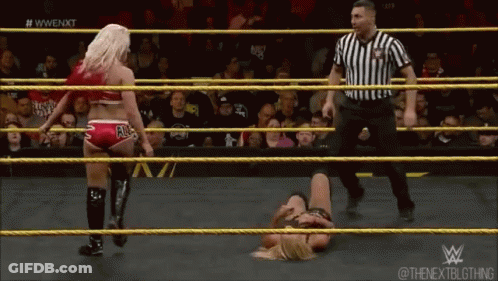 Woman Lying In Wrestling Ring GIF