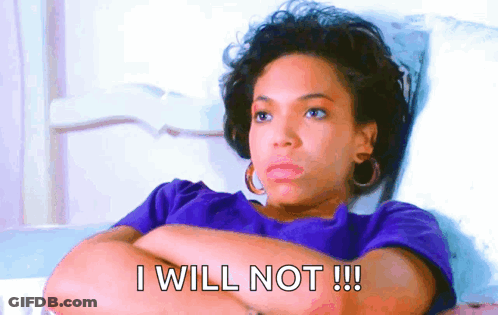 Woman Lying On Bed With Crossed Arms GIF