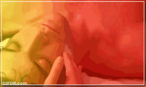Woman Lying On Bed With Eyes Closed GIF