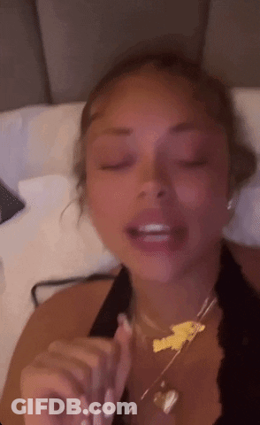 Woman Lying On Bed With Eyes Closed GIF