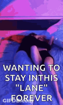 Woman Lying On Bed With Purple Light GIF