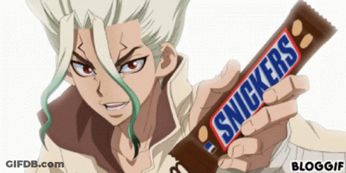 Woman Lying On Bed With Snickers Bar GIF