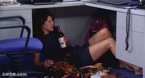 Woman Lying On Floor Holding California Wine Bottle GIF