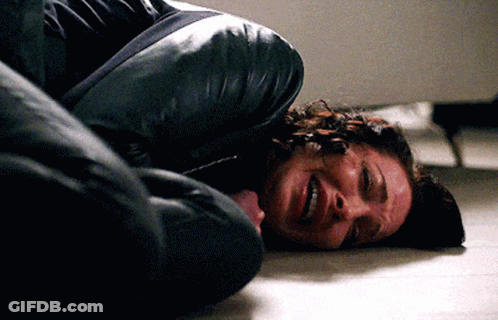 Woman Lying On Floor With Eyes Closed GIF