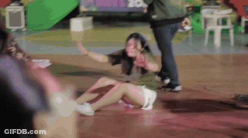 Woman Lying On Floor With May 20 Sign GIF