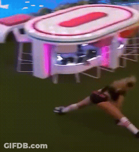 Woman Lying On Ground By Table With O GIF