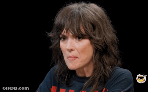 Woman Making Face Saying It's Weird GIF