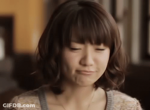Woman Making Face With Eyes Closed GIF