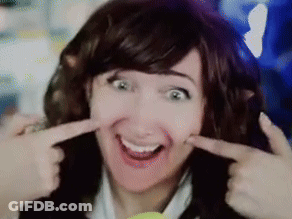 Woman Making Face With Fingers GIF