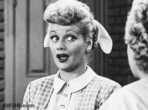 Woman Making Funny Face At Another Woman GIF