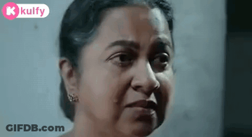 Woman Making Funny Face At Camera GIF