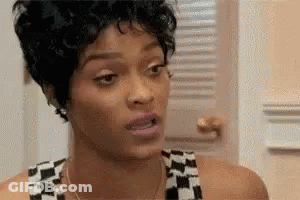 Woman Making Funny Face At Camera GIF