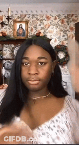 Woman Making Funny Face At Jesus Picture GIF