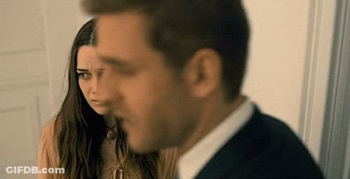 Woman Making Funny Face At Man GIF