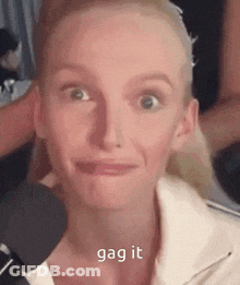 Woman Making Funny Face At Microphone Gag It GIF