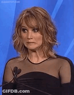Woman Making Funny Face At Microphone GIF