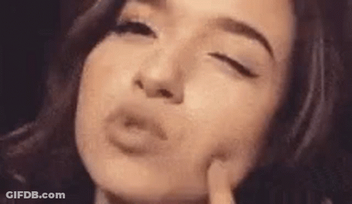 Woman Making Funny Face Close Up GIF