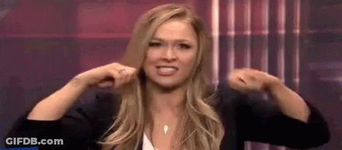 Woman Making Funny Face Holding Ponytail GIF