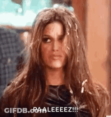 Woman Making Funny Face Holding Ponytail GIF