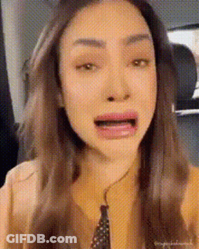 Woman Making Funny Face In Back Seat GIF