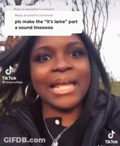 Woman Making Funny Face In Black Jacket And Earrings GIF