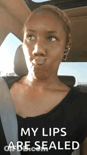 Woman Making Funny Face In Car: My Lips Are Sealed GIF