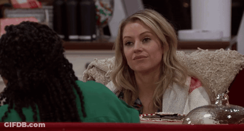 Woman Making Funny Face In Chair GIF