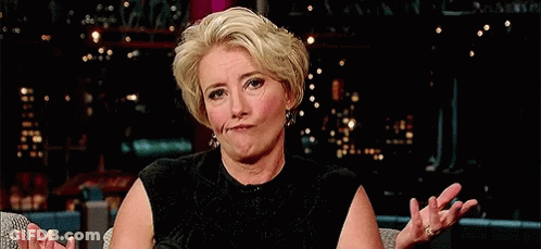Woman Making Funny Face In Chair GIF