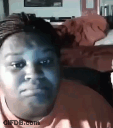 Woman Making Funny Face In Chair GIF