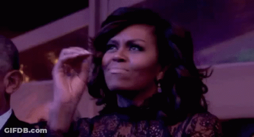 Woman Making Funny Face In Dark Room GIF
