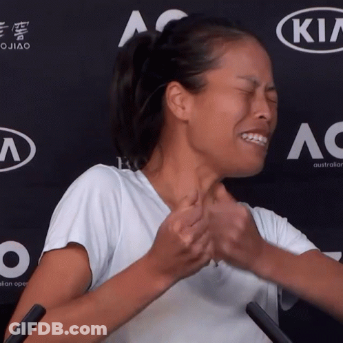 Woman Making Funny Face In Front Of Kia Sign GIF