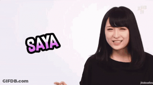 Woman Making Funny Face In Front Of Saya Sign GIF