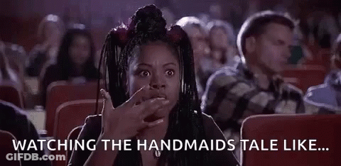 Woman Making Funny Face In Movie Theater GIF