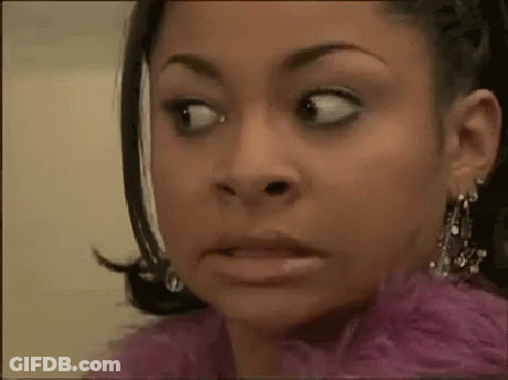 Woman Making Funny Face In Pink Fur Coat GIF