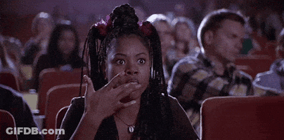 Woman Making Funny Face In Theater GIF