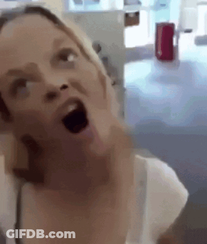 Woman Making Funny Face Mouth Wide Open GIF