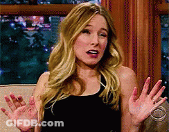 Woman Making Funny Face On Couch GIF