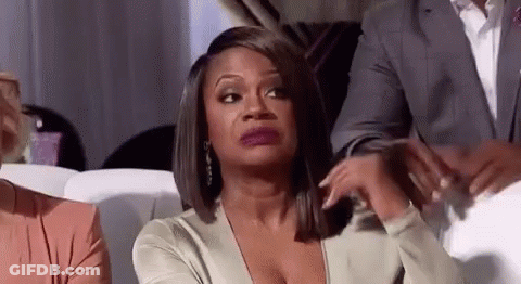 Woman Making Funny Face On Couch GIF