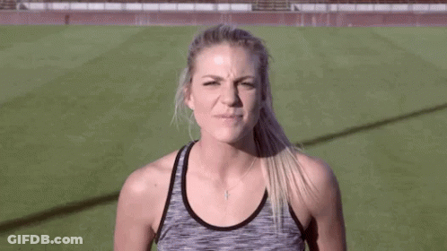 Woman Making Funny Face On Field GIF