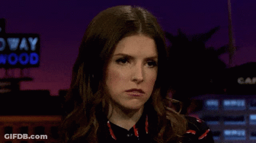 Woman Making Funny Face On Stage GIF
