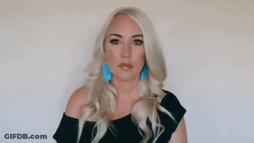Woman Making Funny Face Pointing At Nose Saying Boo Hoo GIF
