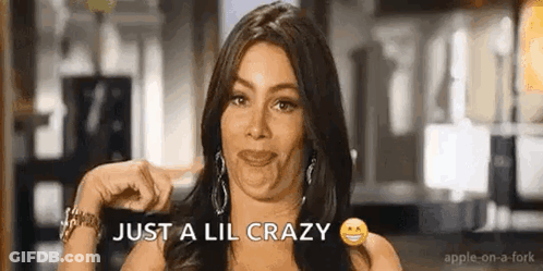 Woman Making Funny Face Pointing GIF