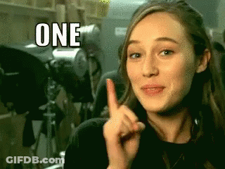 Woman Making Funny Face Pointing Up With One GIF