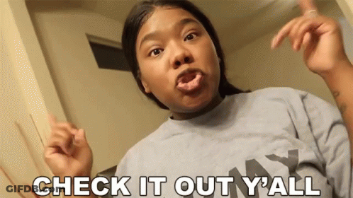 Woman Making Funny Face Saying Check It Out GIF
