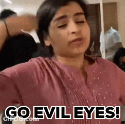 Woman Making Funny Face Saying Go Evil Eyes GIF