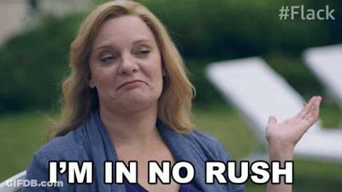Woman Making Funny Face Saying No Rush GIF