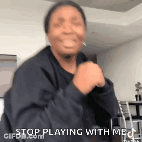 Woman Making Funny Face Saying Stop Playing With Me GIF