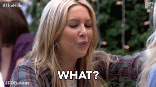 Woman Making Funny Face Saying What GIF