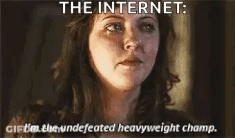 Woman Making Funny Face The Internet I'm The Undefeated Heavyweight Champ GIF