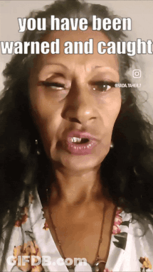 Woman Making Funny Face Warning Caught GIF